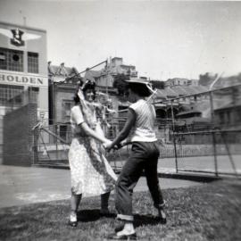 Girls dancing in playground, McElhone Street Woolloomooloo, 1960s