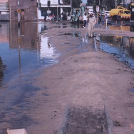 Flooding due to failure of 48 inch water main in Elizabeth St Redfern.