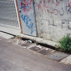 Wall covered in graffiti, Sturt Street Darlinghurst, 1993