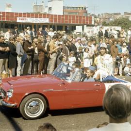 Pageant entrant, Waratah Spring Festival parade, College Street Sydney, 1966