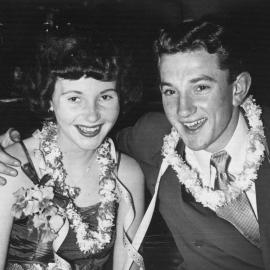 Lois Flett and Frank Margan at a dinner party, 1952