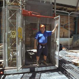 Lobana / Rialto Apartments Construction, Pitt Street Sydney showing workmen in  lift, 2002