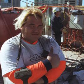 View of worker at The Village, George Street Sydney, 2005