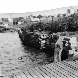 Sunken boat, containers, and wharf around Blackwattle Bay, Ferry Road Glebe, 1970