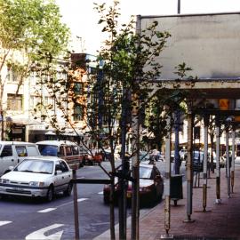 Young trees in Wentworth Avenue in handlaid brick pavements around The Connaught.