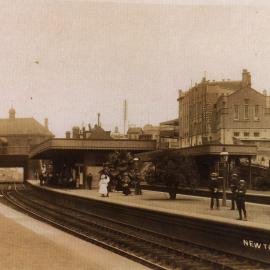 Waiting for a train on the platform of Newtown Railway Station, King Street Newtown, 1916