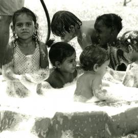 Kids playing in a pool, circa 1990s