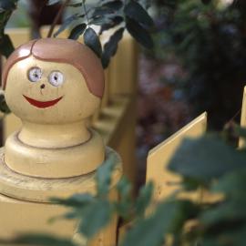 Decorated fence posts.