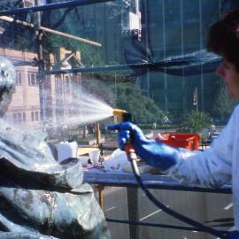 Conservator on scaffold restoring Shakespeare Memorial, Shakespeare Place Sydney, no date