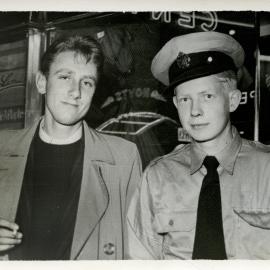 Street photograph of two men