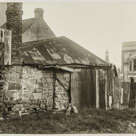 Print - Vacant block and buildings in Gloucester Street The Rocks, 1922