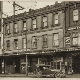 Print - Commercial businesses in Elizabeth Street Sydney, 1926