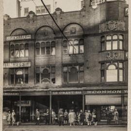 Print - Commercial premises and tram stop, George Street Sydney, 1926