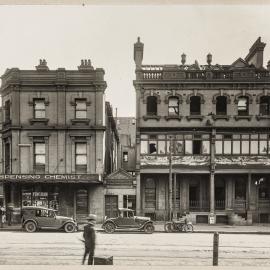 Print - Streetscape with Fincham chemist in Elizabeth Street Sydney, 1928