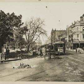 Print - Looking south along Elizabeth Street from St James Road Sydney, 1909