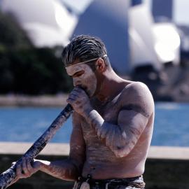 Digeridoo player at Wuganmagulya (Farm Cove) launch, Royal Botanic Gardens Sydney, 2000