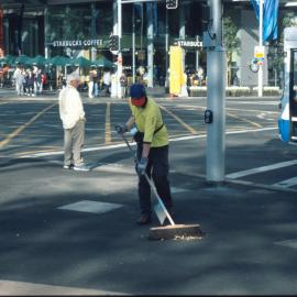 City of Sydney street cleaning team at work, corner William and Park Streets, Sydney, 2000