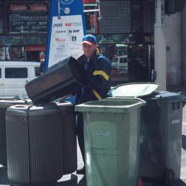 Council staff emptying garbage bins at Circular Quay Sydney, 2000