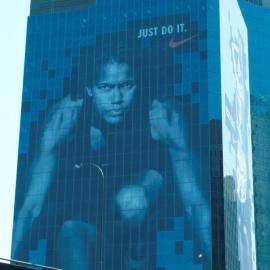 Cathy Freeman, advertising on city building during Olympics,  Kent Street Sydney, 2000