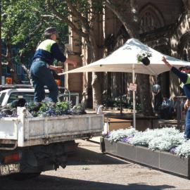 Fixing the flowers at Sydney Square, George Street, Sydney, 2000