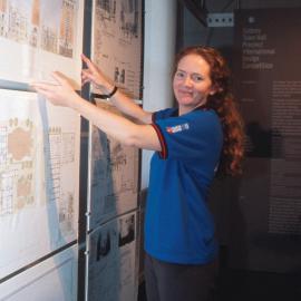 Adjusting the display at City Exhibition Space, Customs House, Sydney, 2000