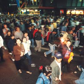 Crowds leaving Circular Quay along George Street after the closing ceremony fireworks Sydney, 2000