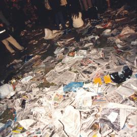 Rubbish on ground after the Olympic closing ceremony at The Domain Olympic Live Site, Sydney, 2000