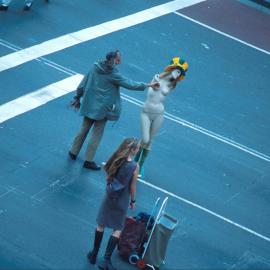 Street entertainers at the Olympic Volunteers Parade, George Street, Sydney, 2000