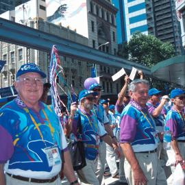 Olympic volunteers at the Olympic Volunteers Tickertape Parade, Park Street Sydney, 2000