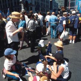 Crowds building up in George Street before the Olympic Athletes tickertape parade, Sydney, 2000