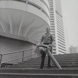 Cleaner on the steps of the MLC Centre, Martin Place Sydney, 1998