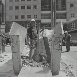 Loading the skip, Castlereagh and Park Streets Sydney, 2000