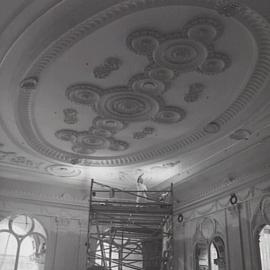 Applying gilding to ceiling restoration, Macquarie Bank's chamber, George Street Sydney, 1999