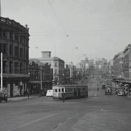 Policeman and tram in William Street Darlinghurst, 1934