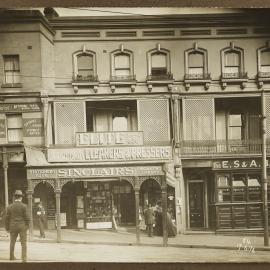 Print - Bank and shops in William Street Darlinghurst, 1916