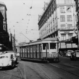 Tram passing Mark Foy's department store,  Elizabeth Street Sydney, 1954