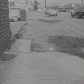 Damaged footpath, Gardeners Road Alexandria, 1968