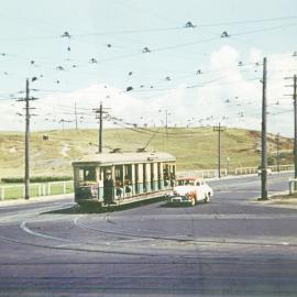 Tram & car in Dacey Avenue, Kensington