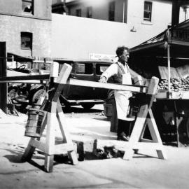 Limbless solider and fruit barrow, Central Street Sydney, 1935