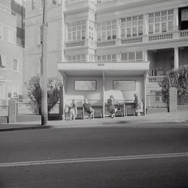 Streetscape and bus shelter at St Vincent's Hospital, Burton Street Darlinghurst, 1970