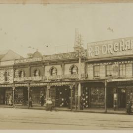 Print - Streetscape with commercial businesses on George Street Haymarket, 1909