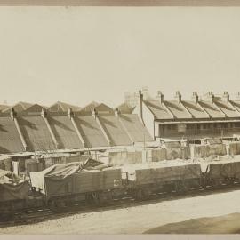 Print - Railway goods train and terrace houses, Quay Street Haymarket, 1910