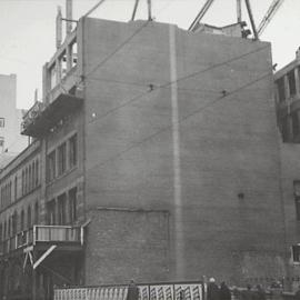 Removal of the fourth floor, rear of the old Sun building on Elizabeth Street Sydney, 1933