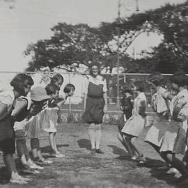 Dance rehearsal at the children's playground, Moore Park Road Anzac Parade, Moore Park, 1936