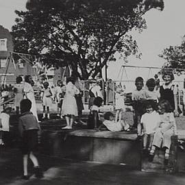 Children playing on the equipment at Moore Park Children's Playground,1936