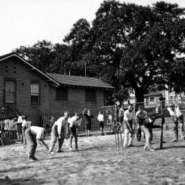 Boys playing cricket, Moore Park Children's Playground, Moore Park Road and Anzac Parade, 1936