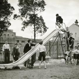 Boys on the slide at Moore Park Children's Playground, 1936