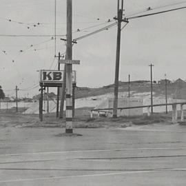 KB signage, Anzac Parade and Dacey Avenue Moore Park, circa 1920