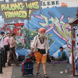 Phuong was framed! A musician about to set up at a small market on Glebe Point Road, Glebe 2003