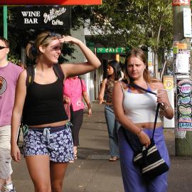 Two women walking past a wine bar, Glebe Point Road Glebe, 2002